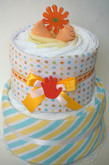 Торт из памперсов "Оранжевый цветочек"